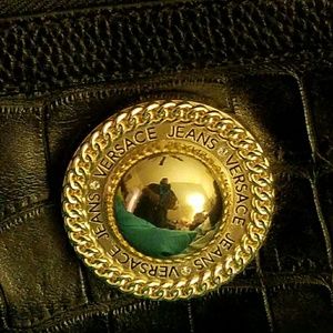 Black versace crocodile backpack.